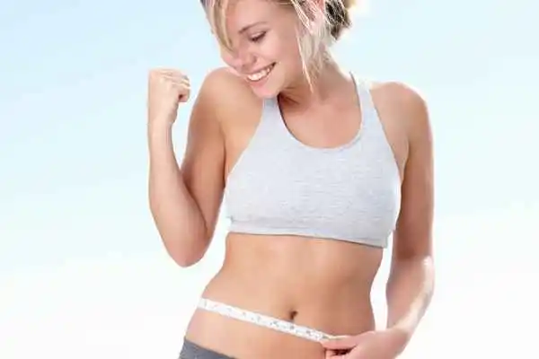 woman happy after fat reduction treatment Nottingham