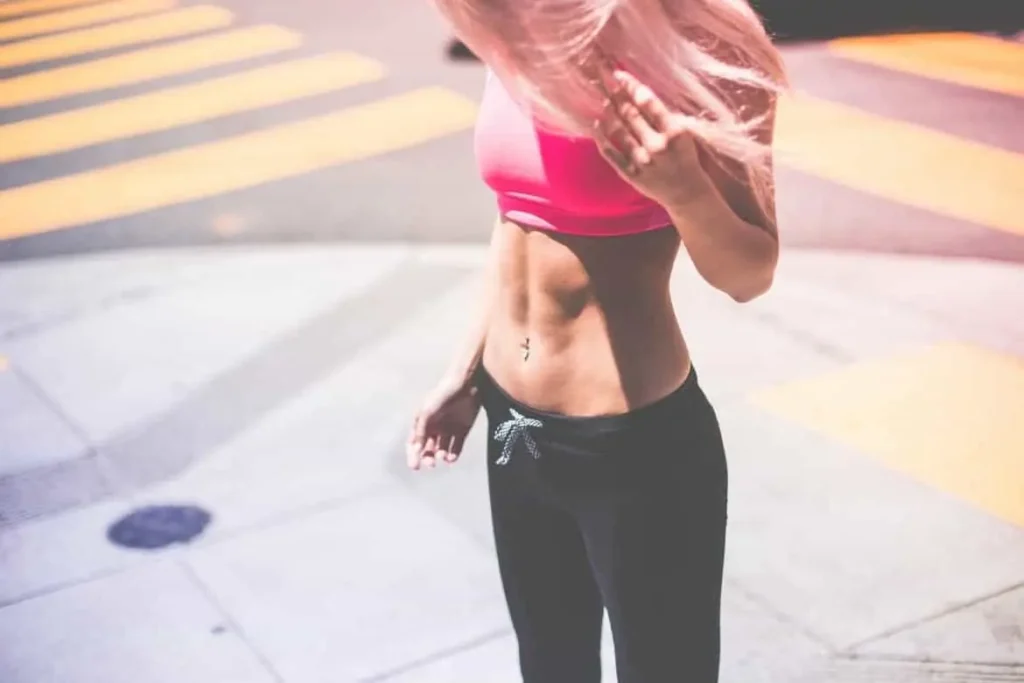 Woman with toned stomach after LA-EMS Body Sculpting Treatment Nottingham
